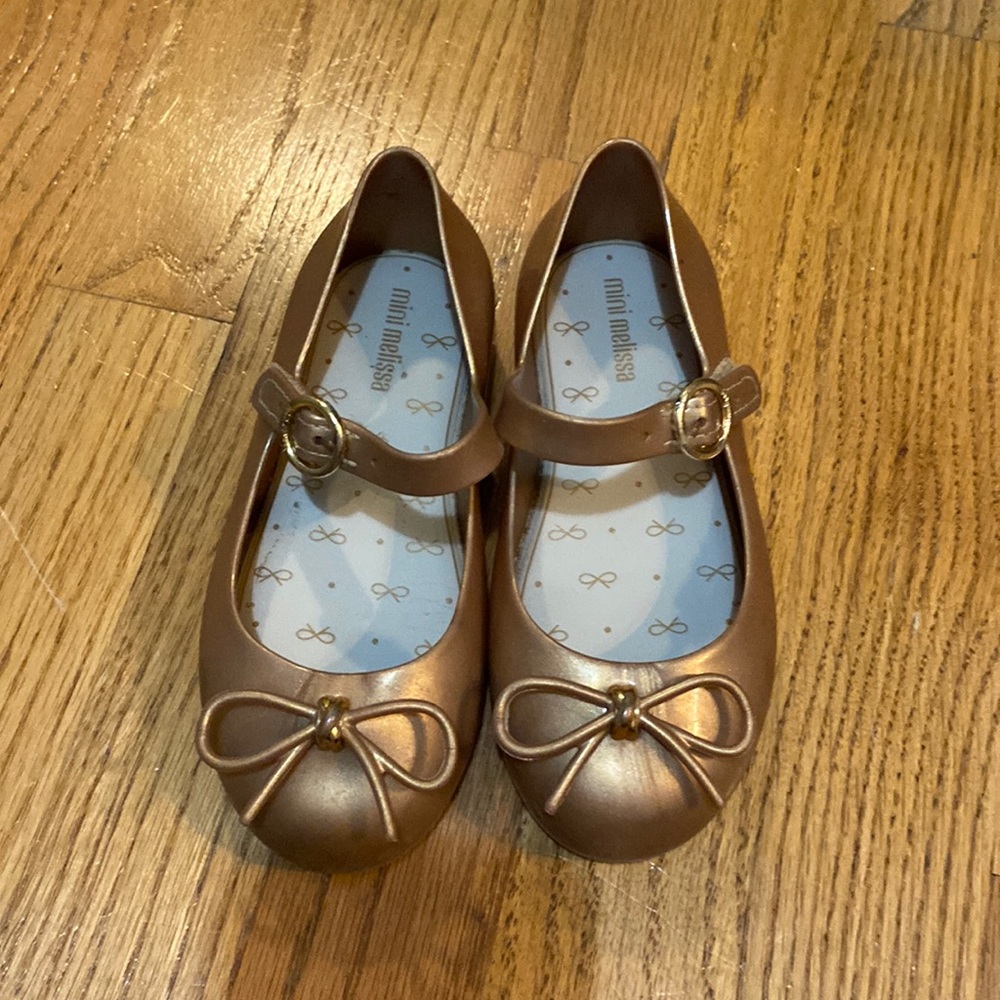 Mini Melissa girls shoes. Size 10. Color is gold